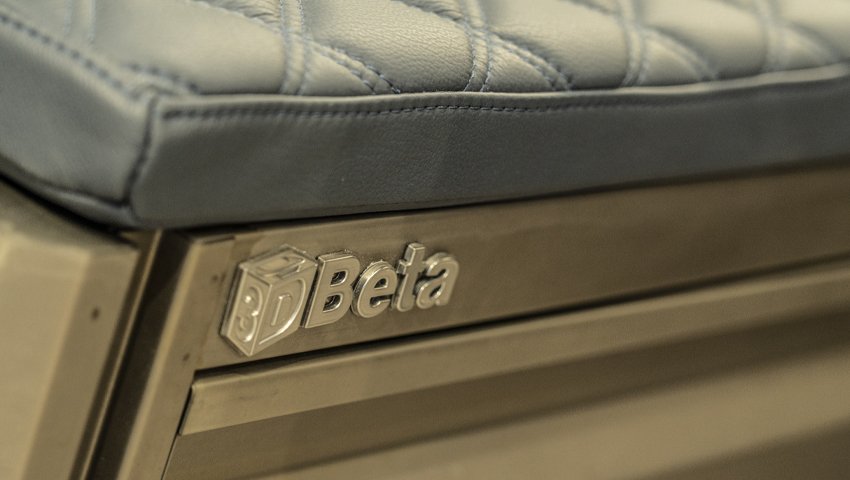 Workshop furniture with padded seat details adds comfort inspired by 3D Beta custom workshop cabinets